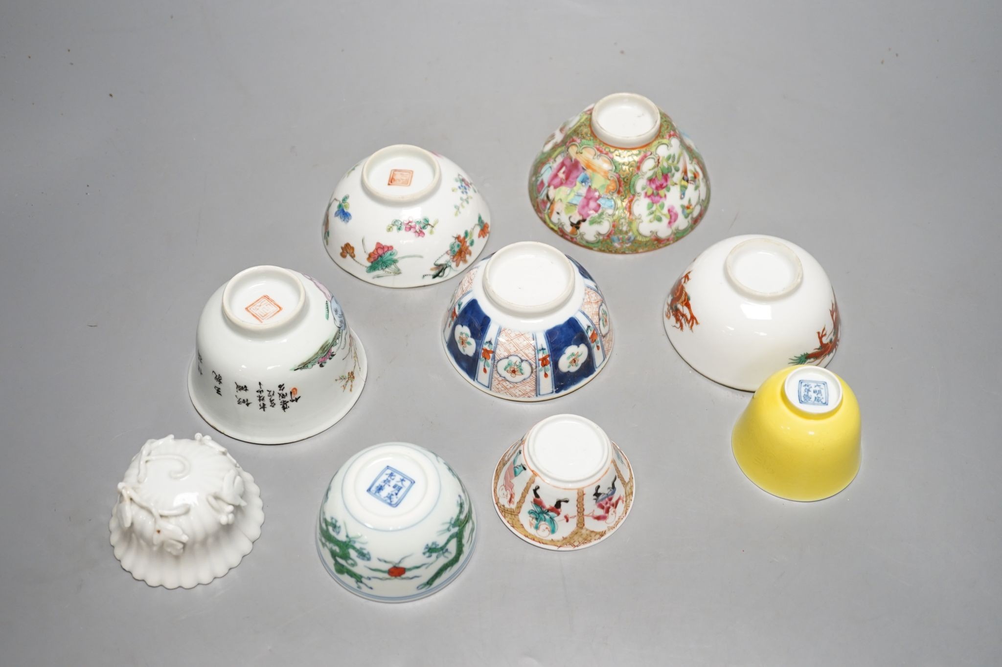Nine Chinese porcelain tea bowls, tallest 6 cm.